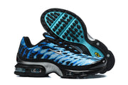 Nike Air Max Plus VII sneakers shown from the side and outsole, highlighting the blue patterned upper and turquoise outsole details.