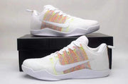 Two side views of white sneakers with multicolor panels and white soles.