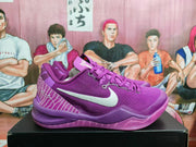 Side view of a purple Nike basketball sneaker showing the light-colored Swoosh, layered sole and contrasting heel graphics.