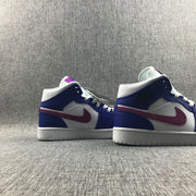 Rear-side view of the pair highlighting the pink side swooshes and blue heel panels