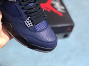 Close-up of the sneaker toe, perforated panel, and black laces