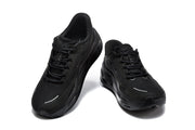 Black Nike Comfort Ride EasyOn sneakers viewed from above and from the front.