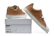 Brown low-top sneakers displayed with a shoebox; the visible box label shows size 40.