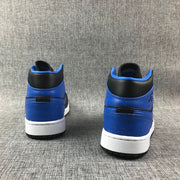 Rear view of the pair showing blue heel panels, black collars, and white midsoles.