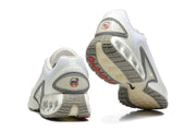 Rear and outsole views of white and grey Nike Air Max DN sneakers.