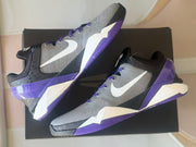 Two Kobe 7 shoes displayed from angled side and outsole views.