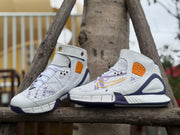Front and side views highlighting the laces, ankle straps, and graphic upper