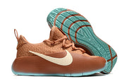 Brown sneaker with a turquoise patterned outsole displayed above another shoe.