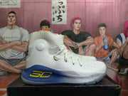 Side view highlighting the white upper, blue heel and yellow side graphic.