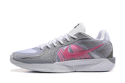 Side profile of a shoe with a pink Nike Swoosh and grey panels.
