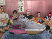 Side view of the light gray and purple-pink sneaker showing mesh panels, a translucent Swoosh, and a pink speckled midsole.