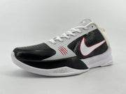 Three-quarter view of the low-top shoe with black toe and side panels and white-and-red Swoosh