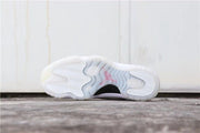 Outsole view showing the translucent rubber sections and central black detail.