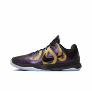 Black and purple Kobe 5 basketball sneaker with large gold decorative side graphics.
