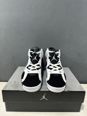 Front view showing the black toe panels, white laces, and Jordan tongue logos.
