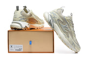 Beige and grey Louis Vuitton sneakers displayed with a branded shoe box.
