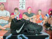 Side profile of a black Nike basketball sneaker with a silver Swoosh, textured upper, patterned outsole, and Zoom branding.