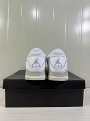 Rear view showing Jordan branding, heel details, and light cream accents on the soles.