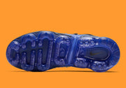 Underside view showing the patterned blue outsole.