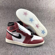 Side view of the pair with one translucent outsole facing upward.