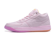 Side profile of a pink mid-top sneaker with a tonal swoosh and layered panels.