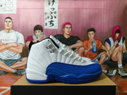 Side profile of a white and blue Jordan high-top sneaker