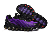 Purple and black Nike Air Max DN8 sneakers shown from the side and outsole.
