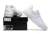 All-white Kobe 8 Protro shoes displayed with a shoe box.