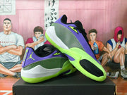 Angled view showing the sides and soles of purple and neon green basketball shoes