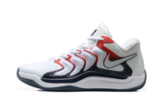 Side profile showing the Nike Swoosh, layered red and black side panels, and white midsole.