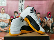 Angled view showing the textured black side panels and yellow outsole of the high-top sneakers