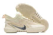 Cream Nike Anthony Edwards 2 basketball shoes with tonal details.