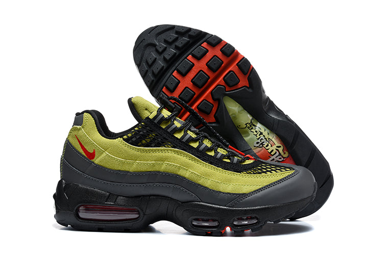 Side view of green and anthracite Nike Air Max 95 TT sneakers with the outsole visible
