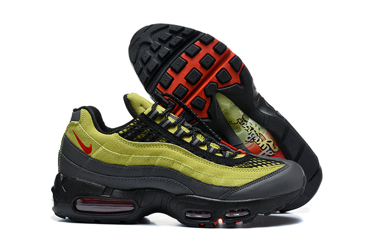 Side view of green and anthracite Nike Air Max 95 TT sneakers with the outsole visible