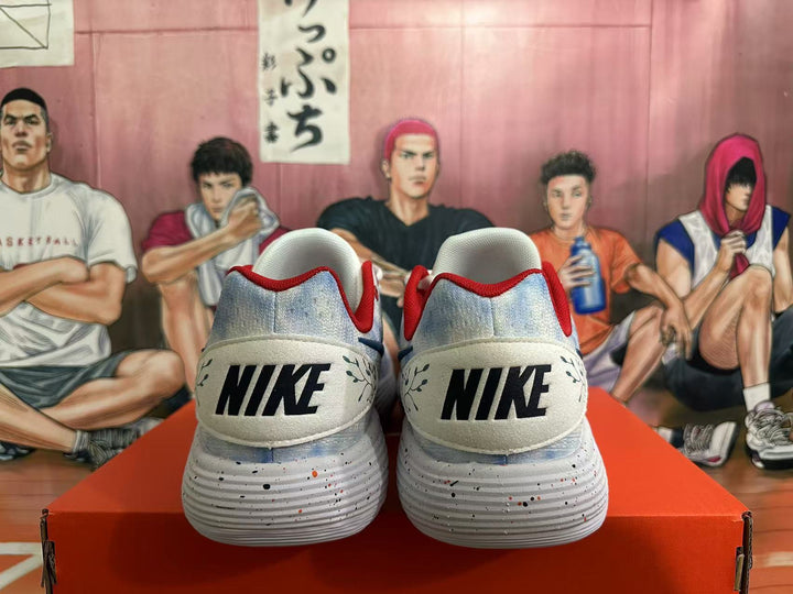 Rear view of Nike basketball sneakers showing Nike heel branding and a dotted white sole.