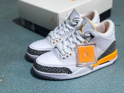 Pair of white and orange Jordan 3-style sneakers with elephant-print overlays and orange hangtag.