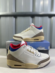 Close three-quarter view of the white Jordan 3 sneaker with textured upper and contrasting elephant-print overlays.