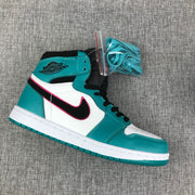 Single Air Jordan 1 high-top shown from the side with an extra set of teal laces.