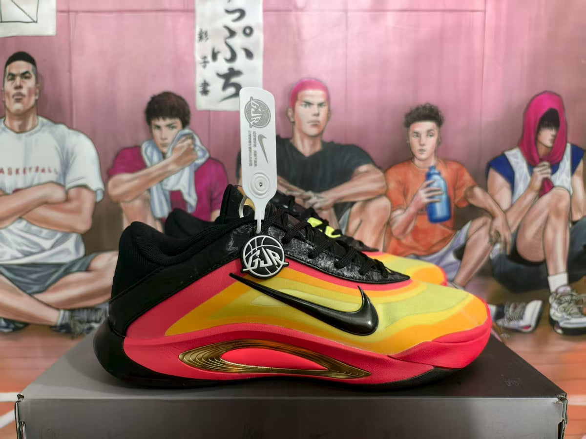 Side view of black Nike basketball sneakers with orange, yellow, and red panels on a shoebox.