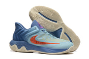 Blue basketball shoes showing the patterned cream outsole and side profile