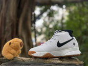 Side profile of a white high-top sneaker showing the black Swoosh, number 8, and gum outsole.