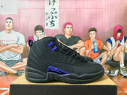 Side view showing the black upper, textured toe and side panels, blue-purple detailing and padded collar.