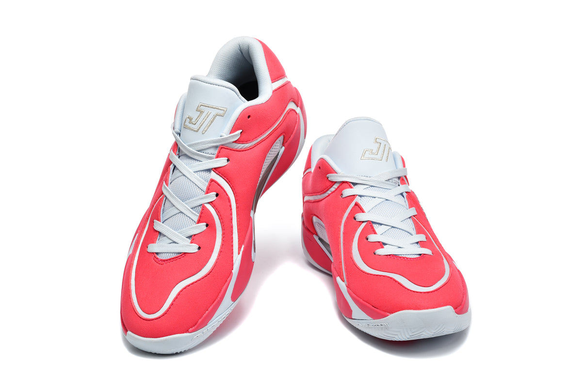 Pair of red and light gray Jordan Luka 4 basketball shoes shown from above