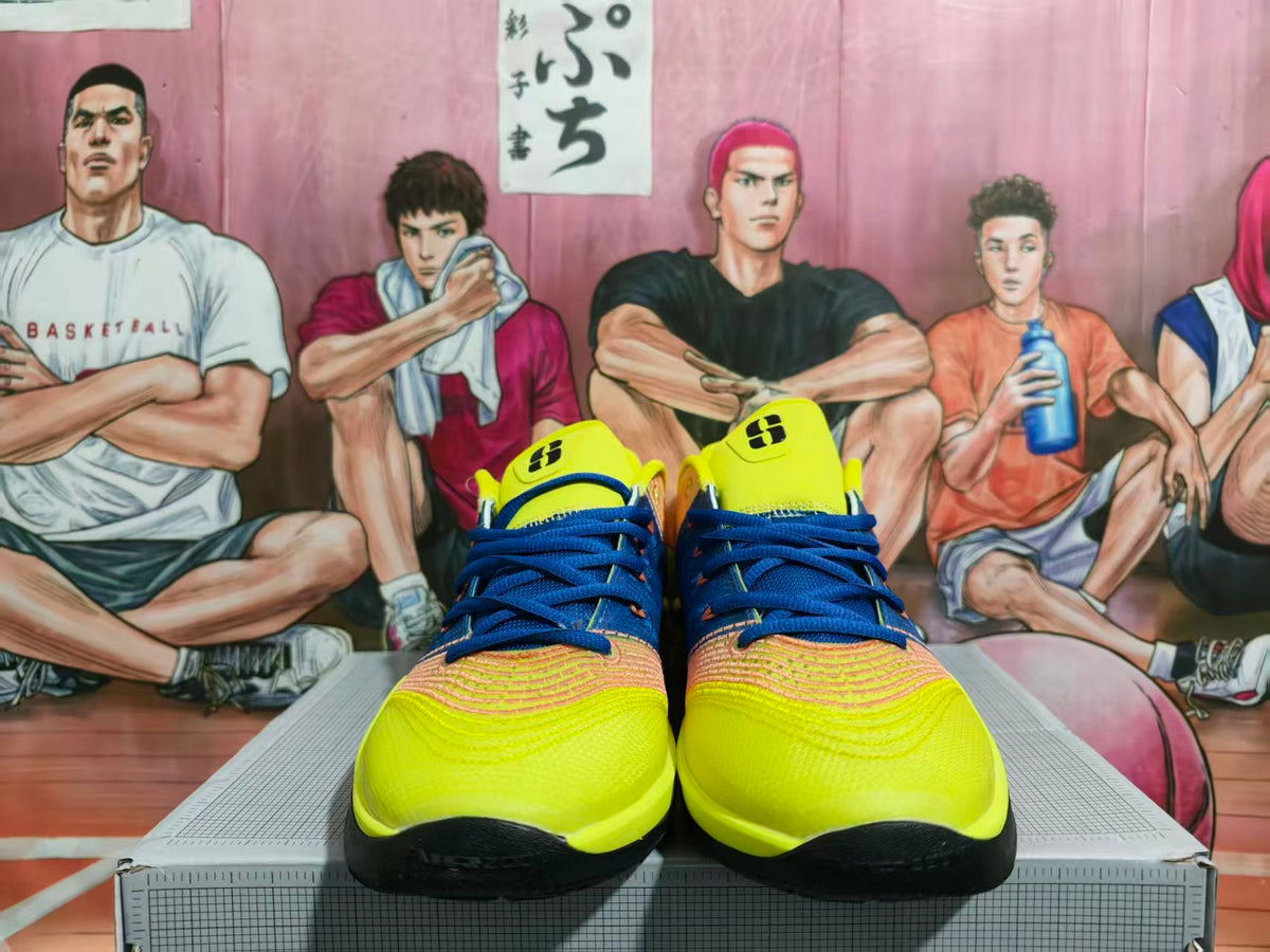 Front view of yellow and blue Nike Kobe 8 basketball shoes