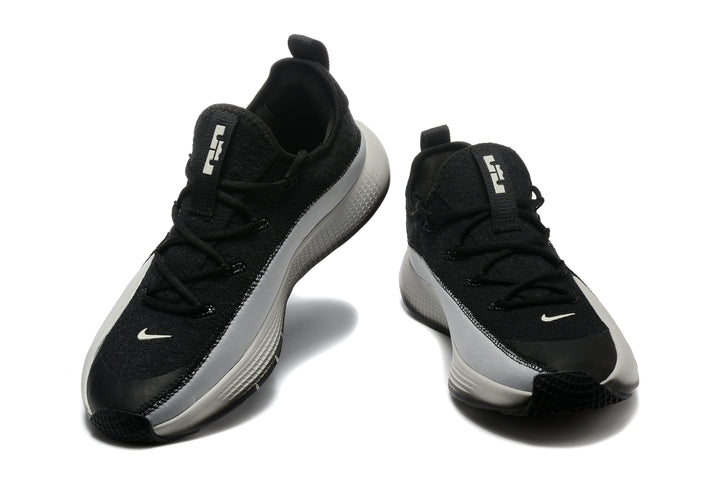Black and light gray Nike LeBron TR1 low-top basketball shoes, front view