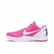 Pink and white Kobe 6 sneaker with a white Swoosh and pink outsole accent.