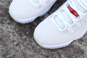 Top-down view highlighting the rounded white toe boxes, laces, and tongue labels.