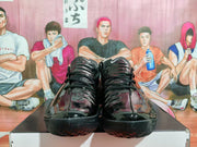 Front view of a pair of black Nike GT Cut 3 basketball shoes.