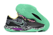 Black basketball shoe with mint green outsole, purple laces, and graphic print.