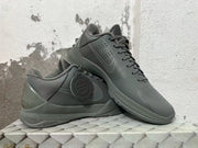 Pair of dark gray Nike Kobe 5 FTB basketball shoes shown from the side.